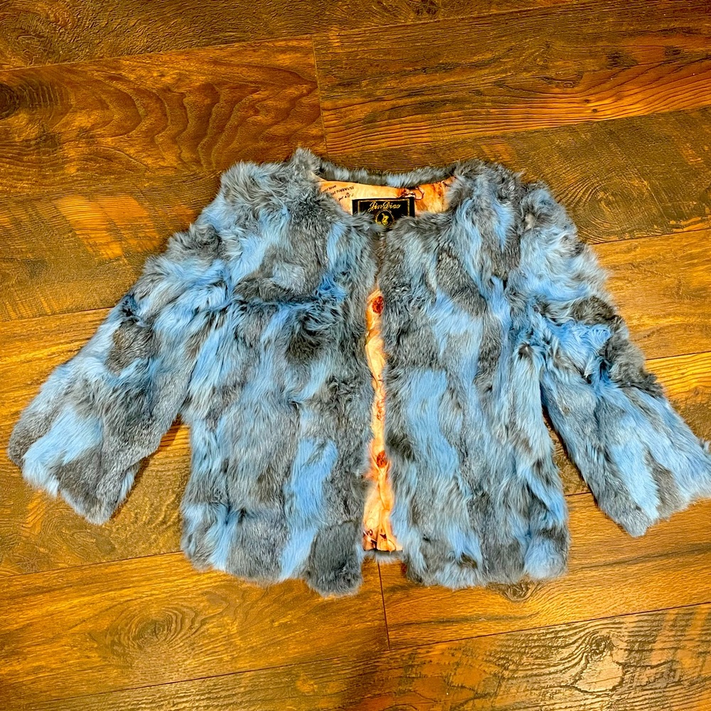 Real fur, rabbit jacket. Size S but runs small